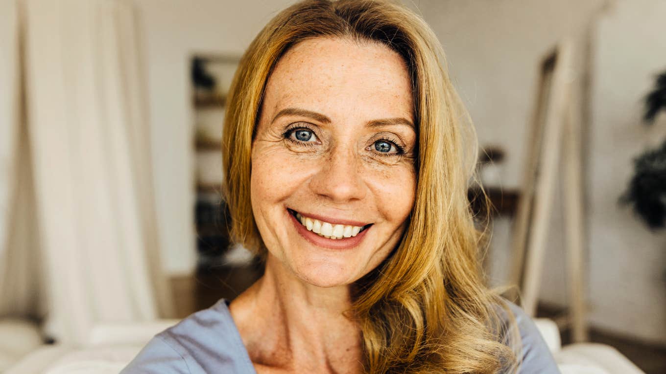 Psychology Says If You Can Master These Skills, You'll Finally Move Past Your Divorce Woman finally moving on after her divorce.