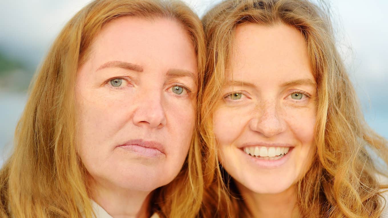 Phrases Parents Don't Want To Hear From Their Adult Children Redhead senior mother and her beautiful adult daughter are walking together and laughing