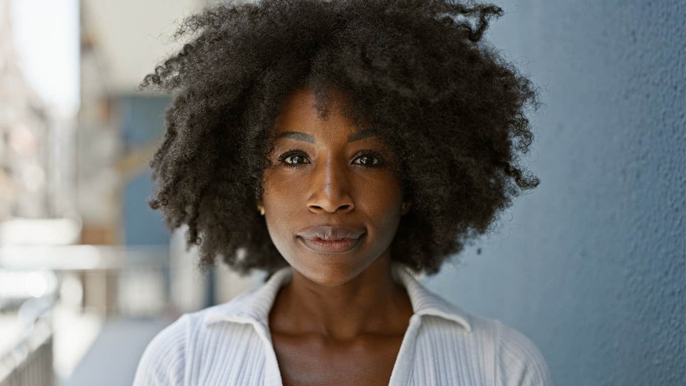 Phrases That Put People Trying To Make You Feel Inferior In Their Place serious woman thinking about what to say