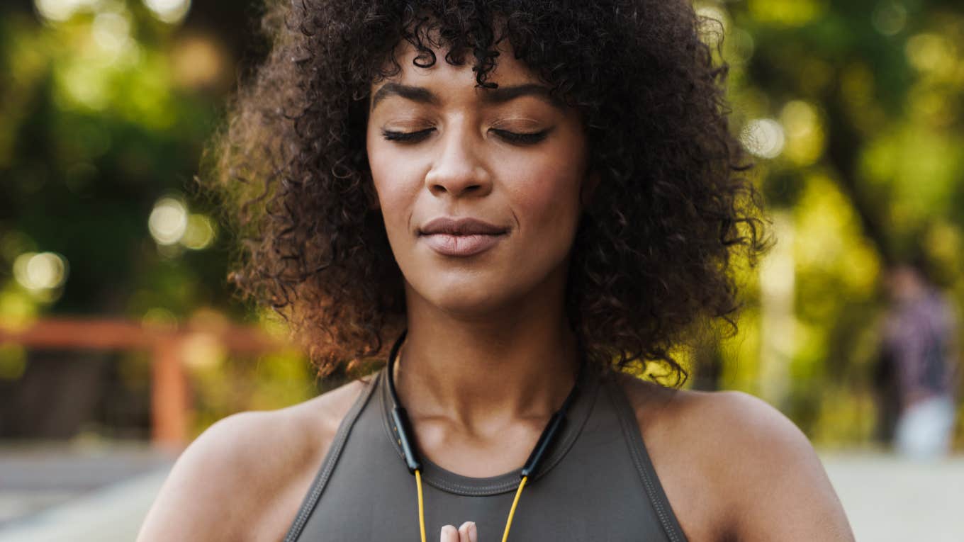 Signs You're Spiritually Blessed And Exude Rare Angel Energy, According To Renowned Medium Woman is spiritually blessed.