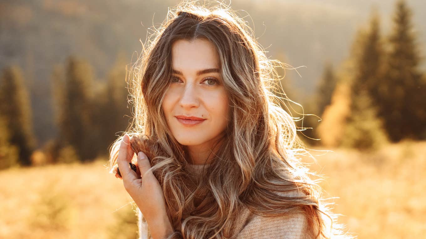 Signs The Universe Is Preparing You To Shift Into A Higher Timeline Woman preparing to shift into a higher timeline