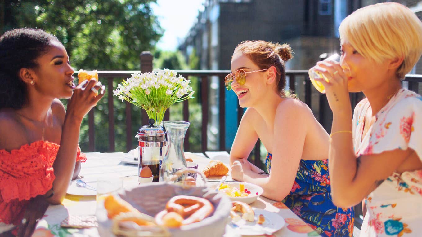 I Was The Sole Reason For My Divorce Because I Couldn't Quit This 'Innocent' Habit Woman gossiping with her girlfriends over brunch.