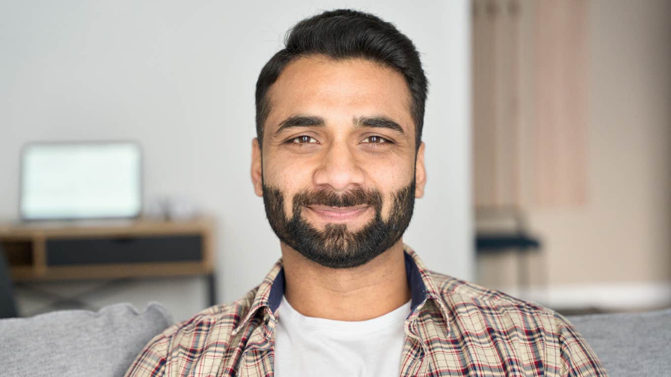 5 Steps To Keep Calm When It Feels Like Everything's Bad Headshot portrait of confident man looking at camera sitting on couch at modern living room