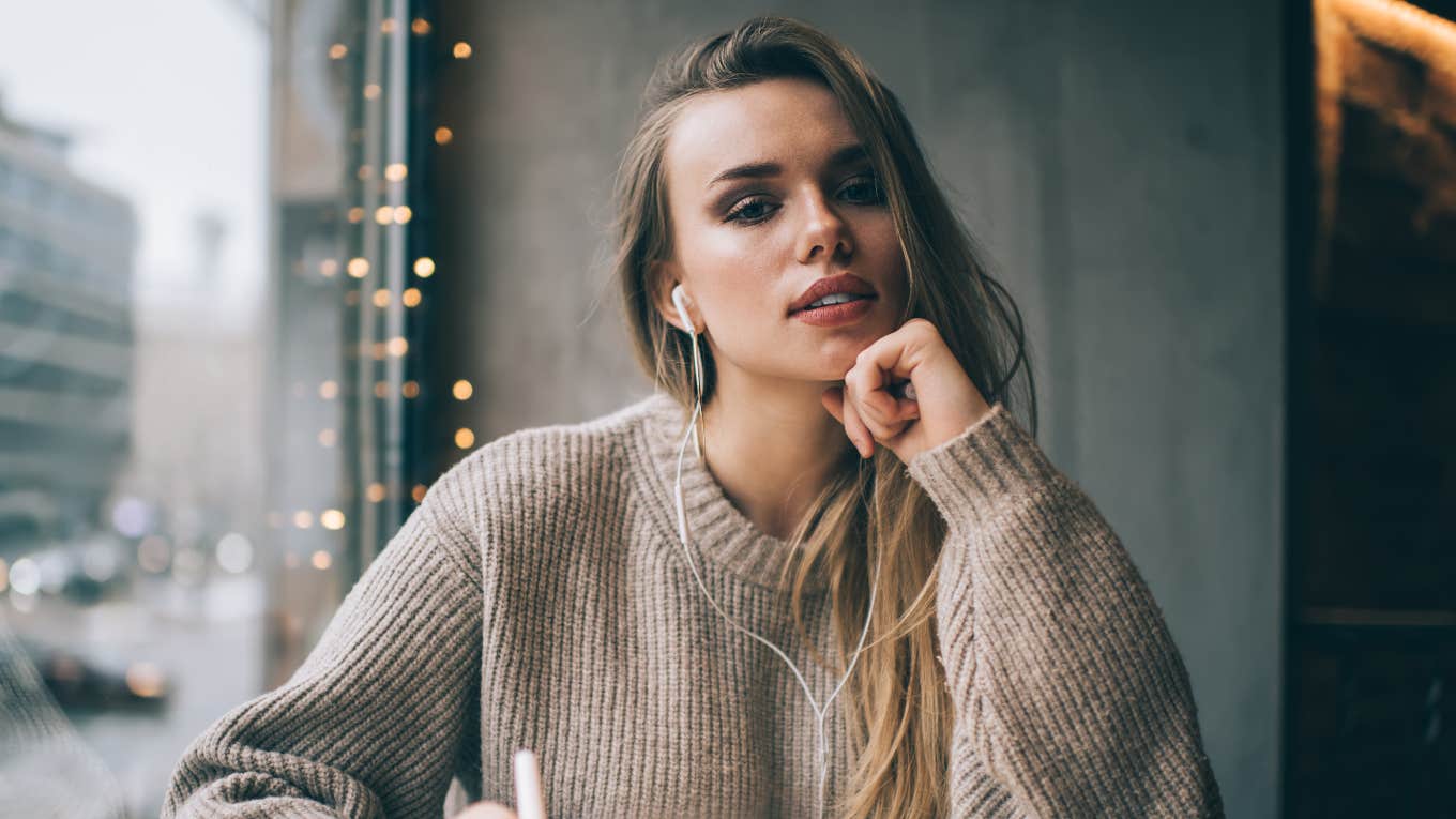 Things Brilliant People Refuse To Do Anymore Smart and thoughtful woman in casual wear and earphones