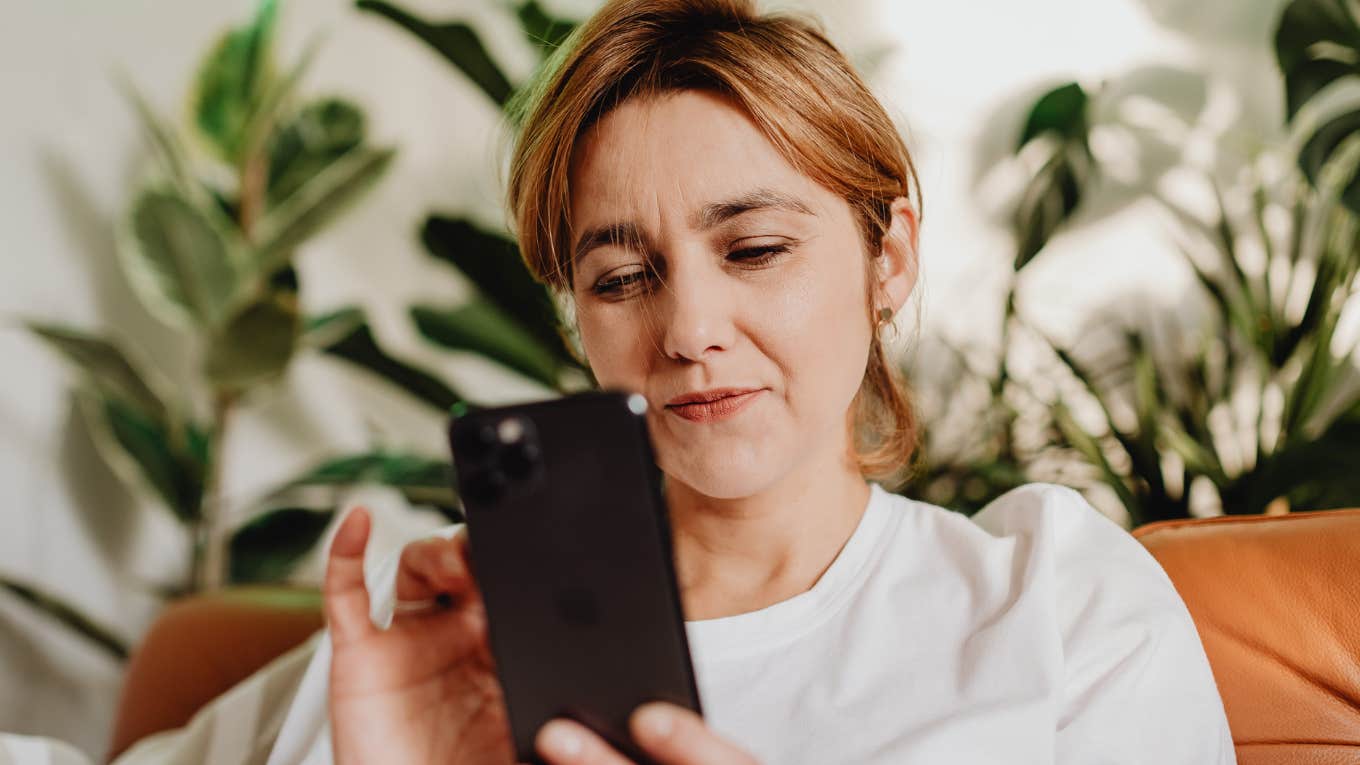 Things Gen-X Women Believe About Love That Are No Longer True Woman Using Smart Phone at Home View more by Photo By: Kaboompics.com