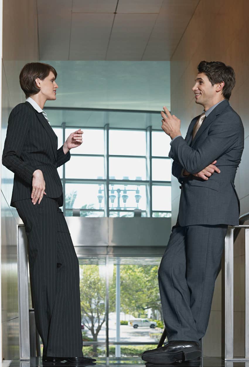 co-workers talking in office