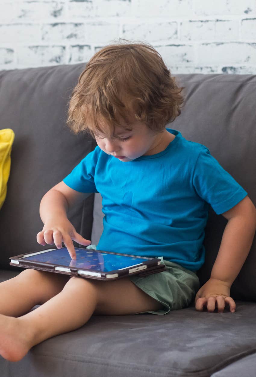 Kid on tablet