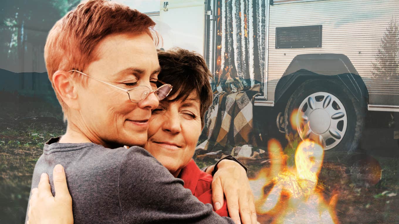 How We Retired Early, Sold Everything, And Traveled The World In A Twenty One-Foot Trailer Retired couple embracing by campfire while traveling in trailer