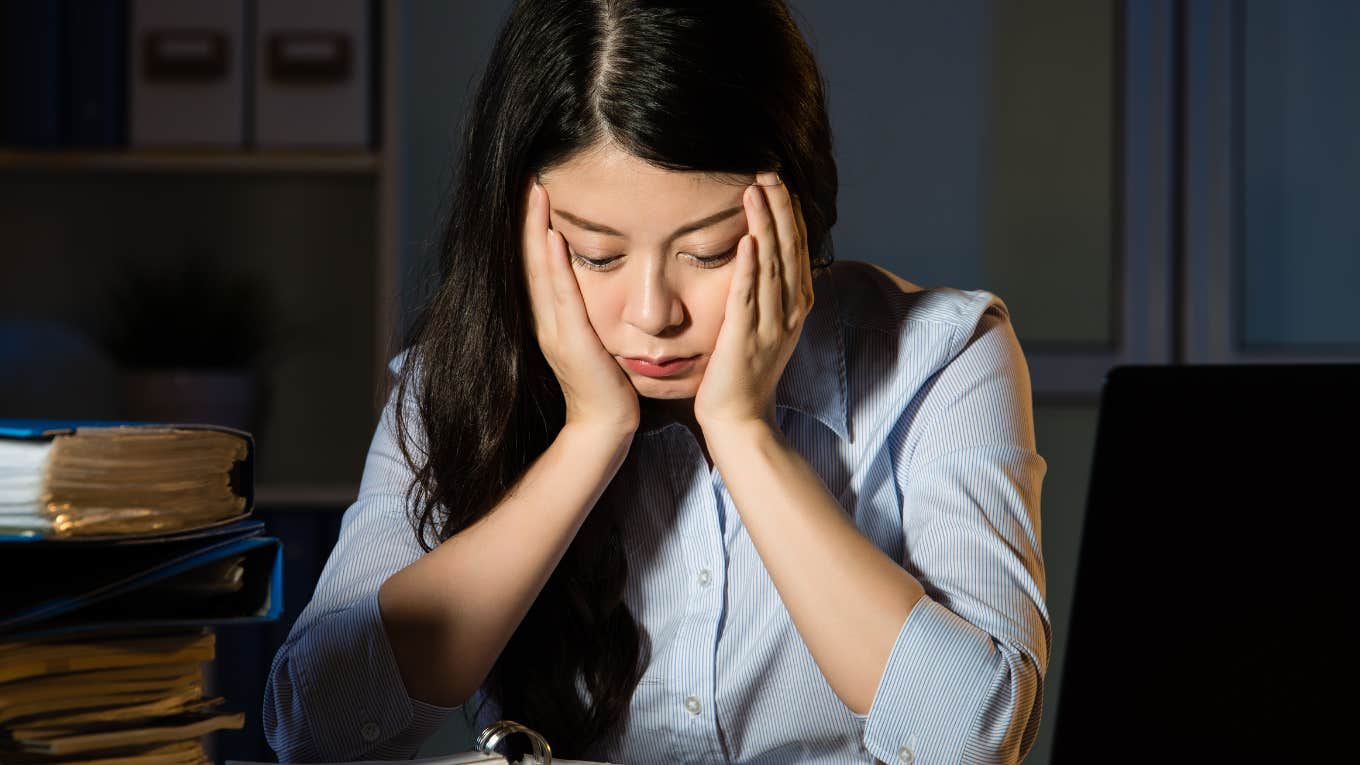 Why Working From Home Is So Exhausting, According To Research Woman finds working from home to be exhausting.