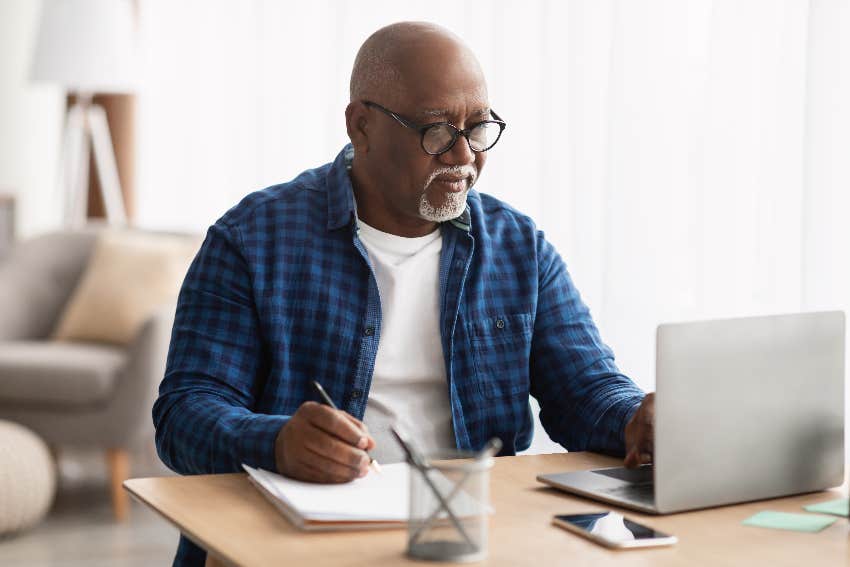 older man on laptop