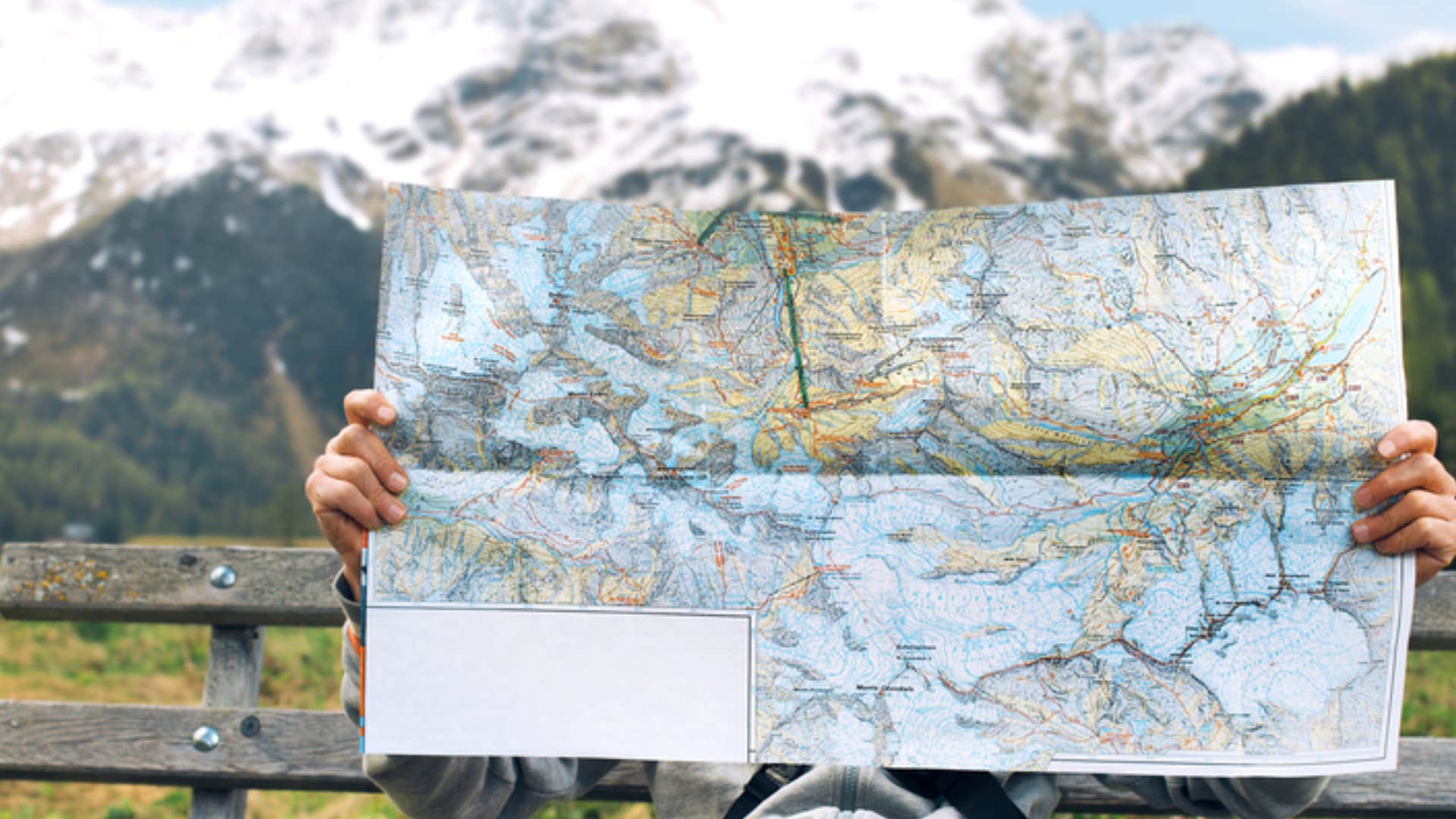 man using a paper map