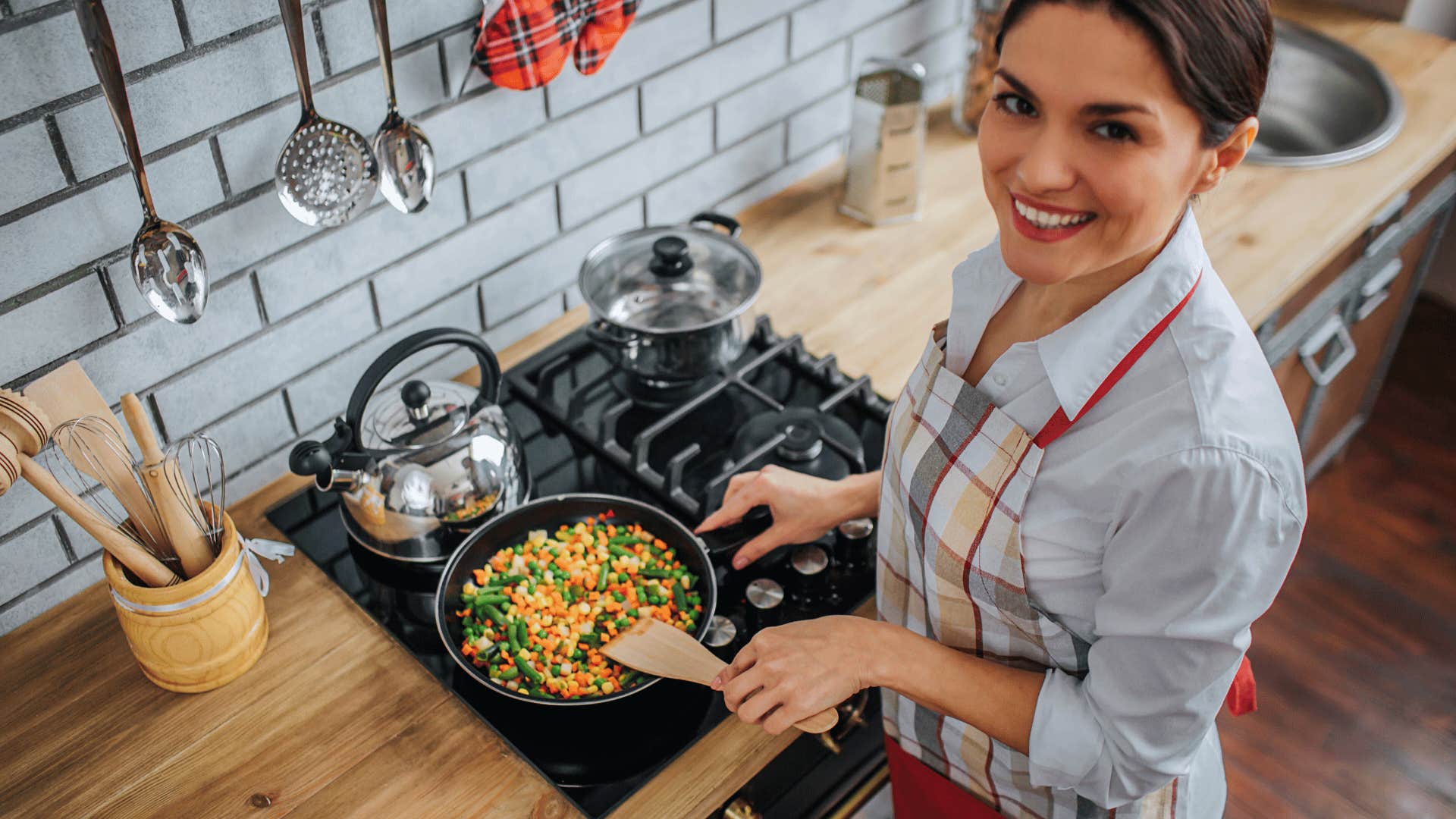 woman cooking for her husband