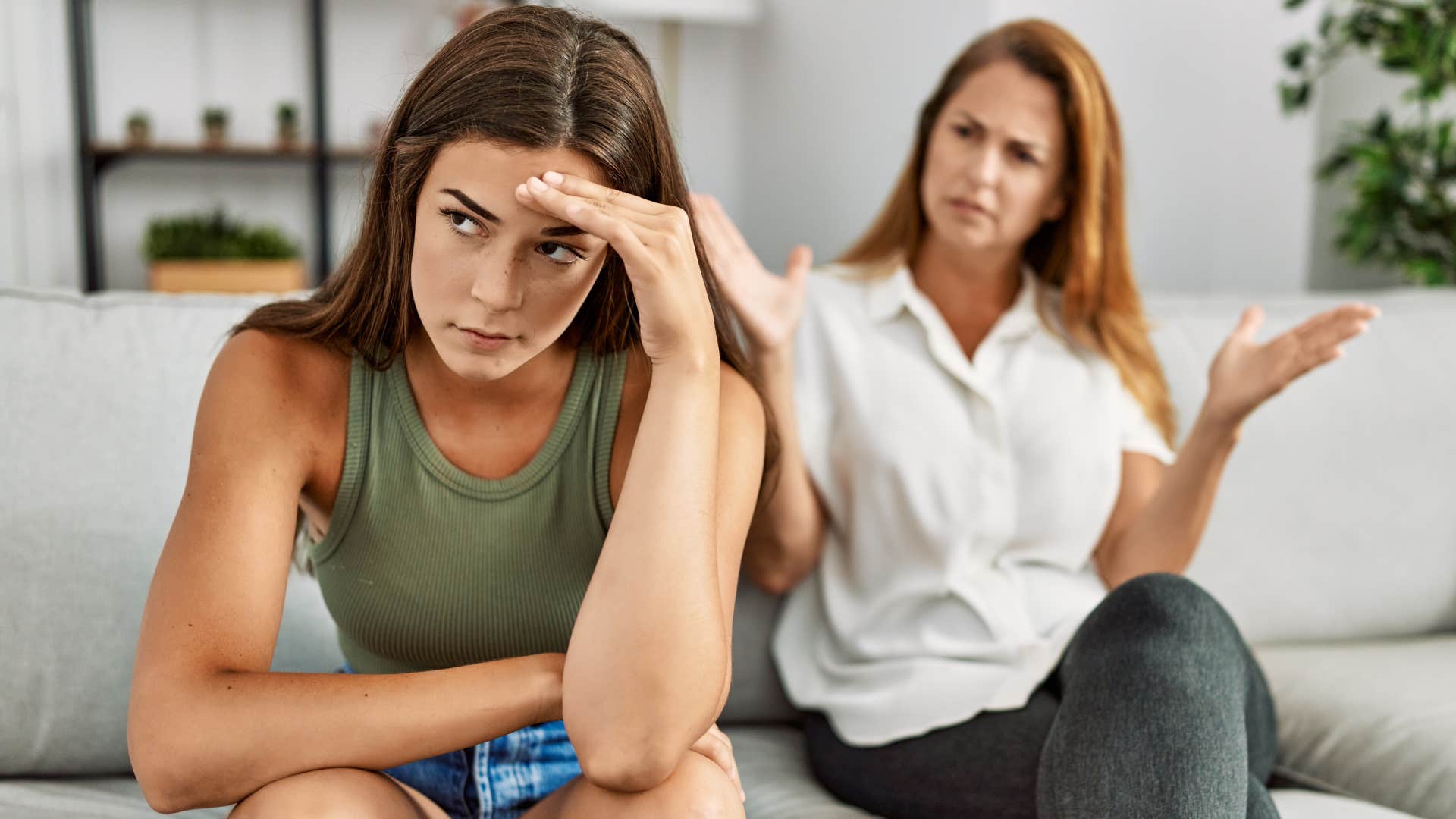 upset woman turned away from her mother