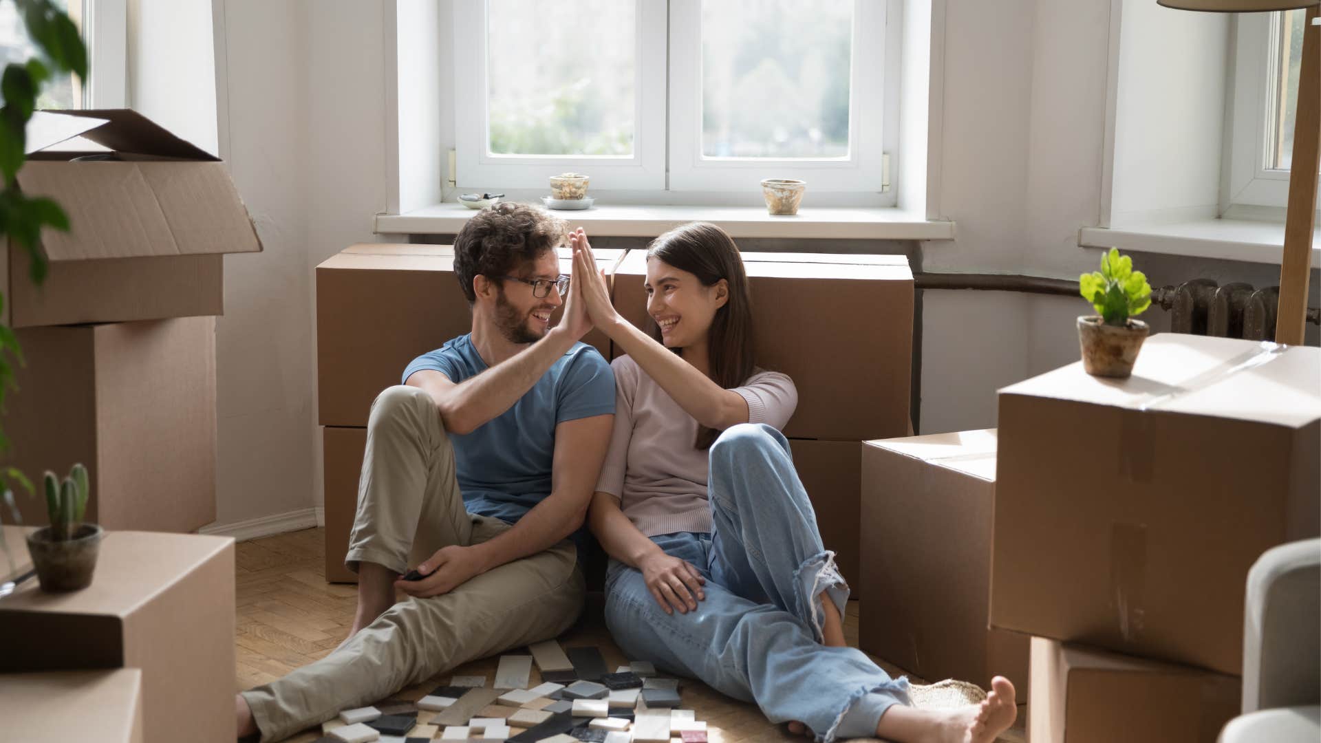 A couple packs their old decorations to get rid of them