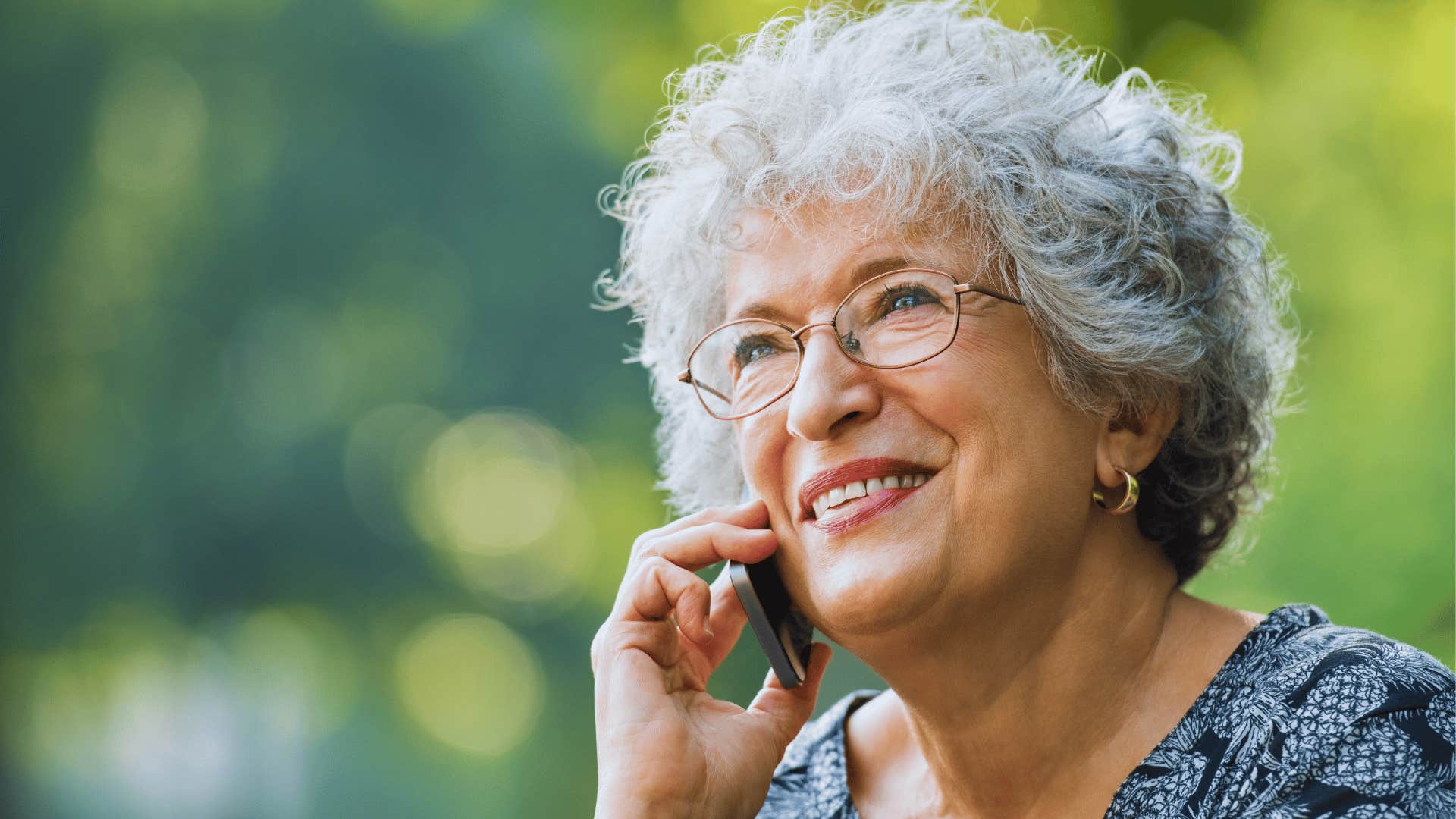 boomer woman happy on a phone call