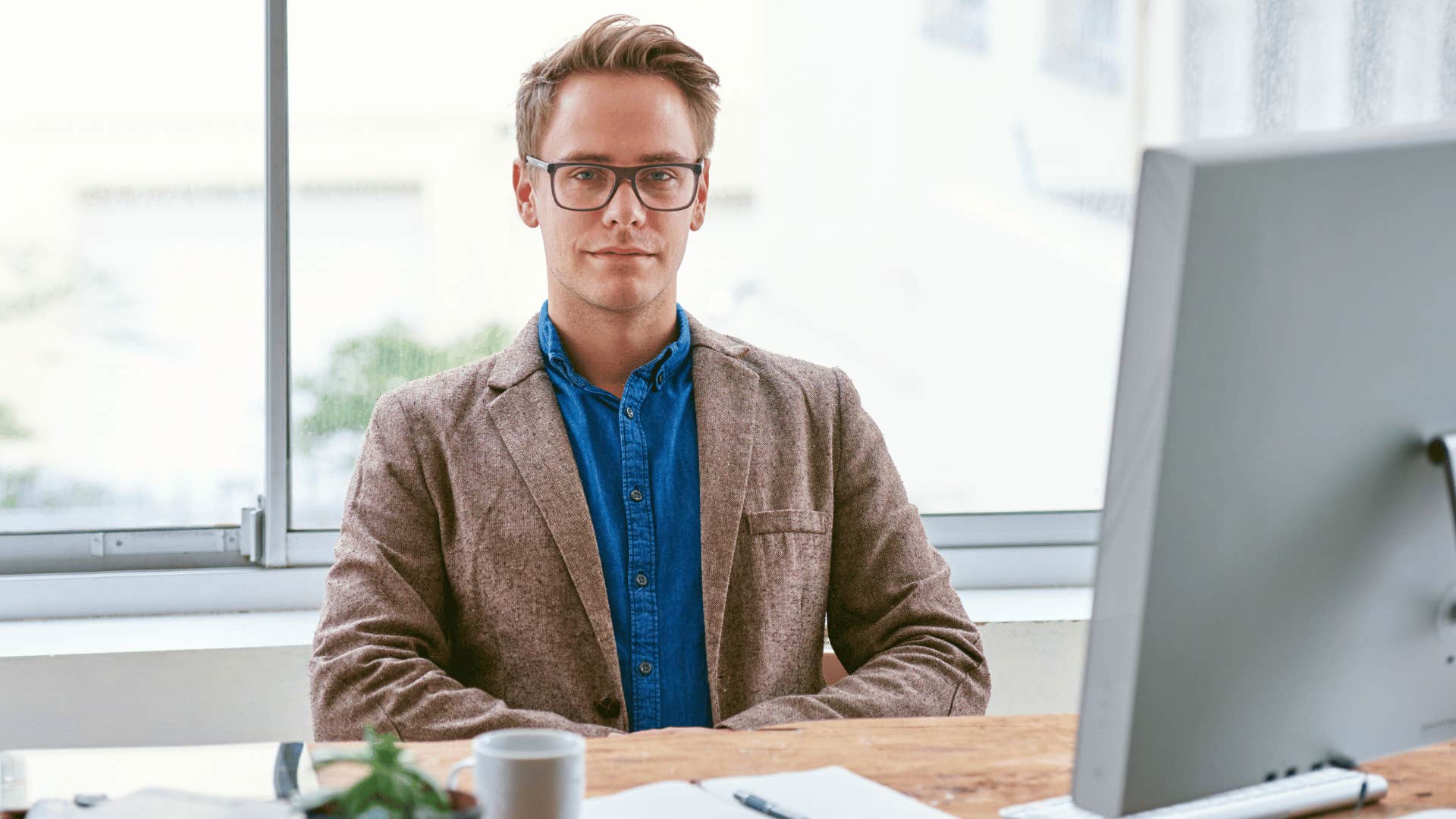 man sitting up straight 