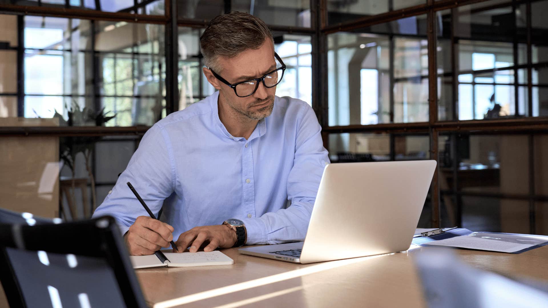 busy man working on laptop