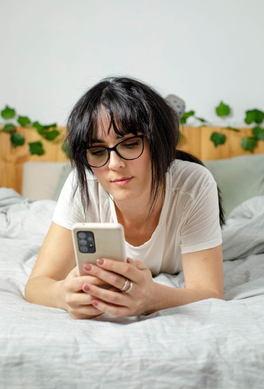 woman doomscrolling despite negative health implications