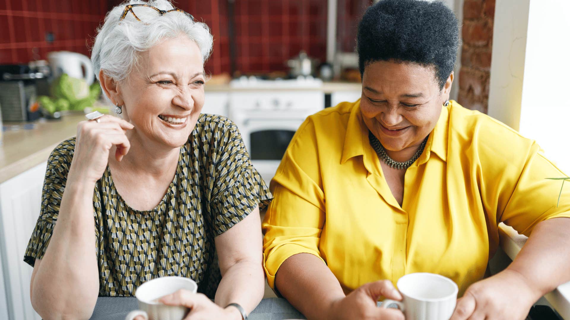 two older women smiling next to each other