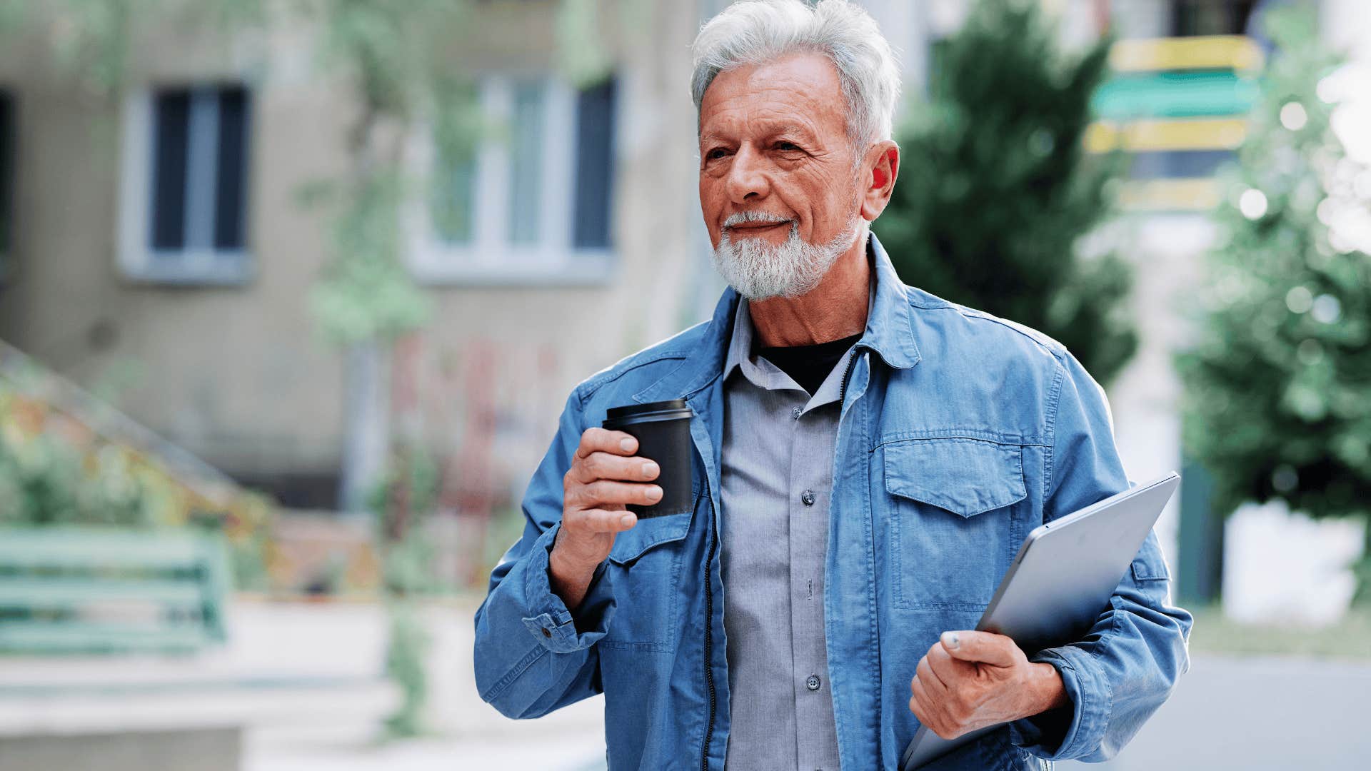 boomer man walking with a coffee