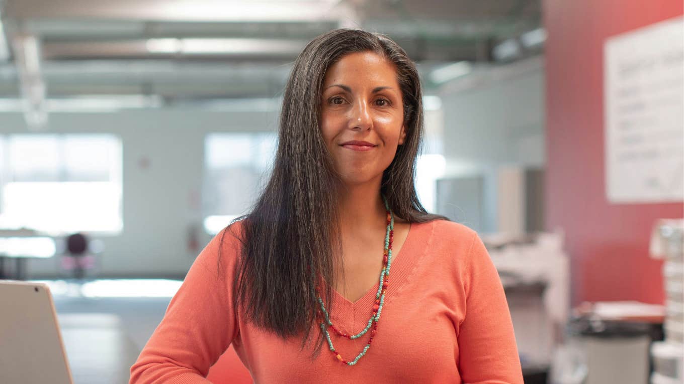 Smart Ways to Keep AI from Stealing Your Job And Stay In Demand, No Matter What Woman keeps AI from stealing job.