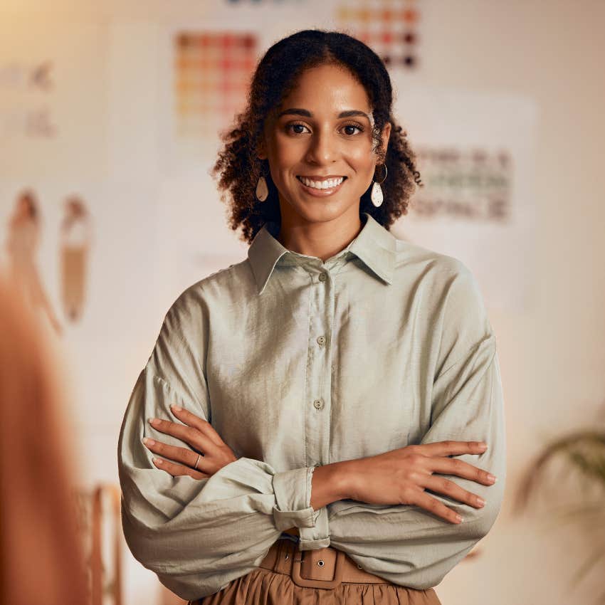smiling woman who knows the secret to wealth and popularity