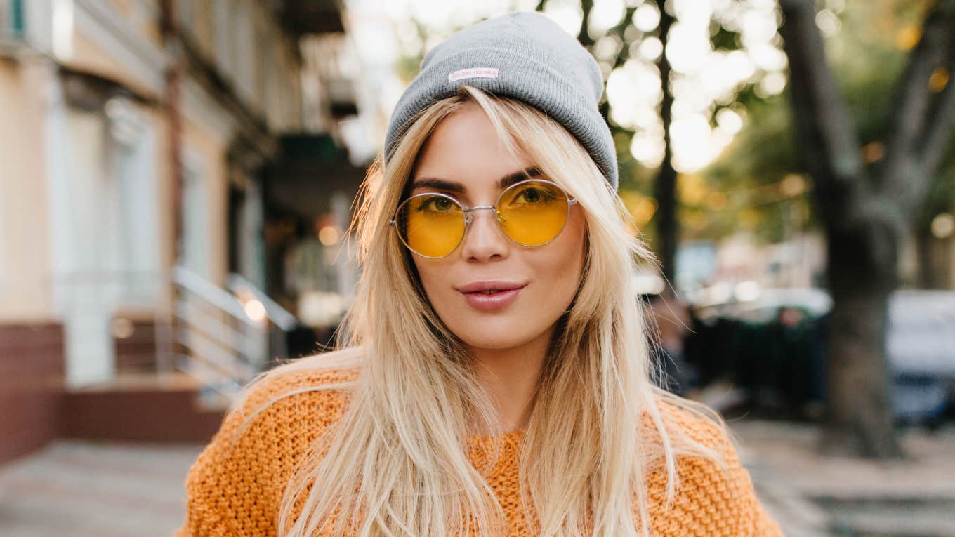 Behaviors People Think Are Mysterious That Are Really Just Rude mysterious woman wearing sunglasses