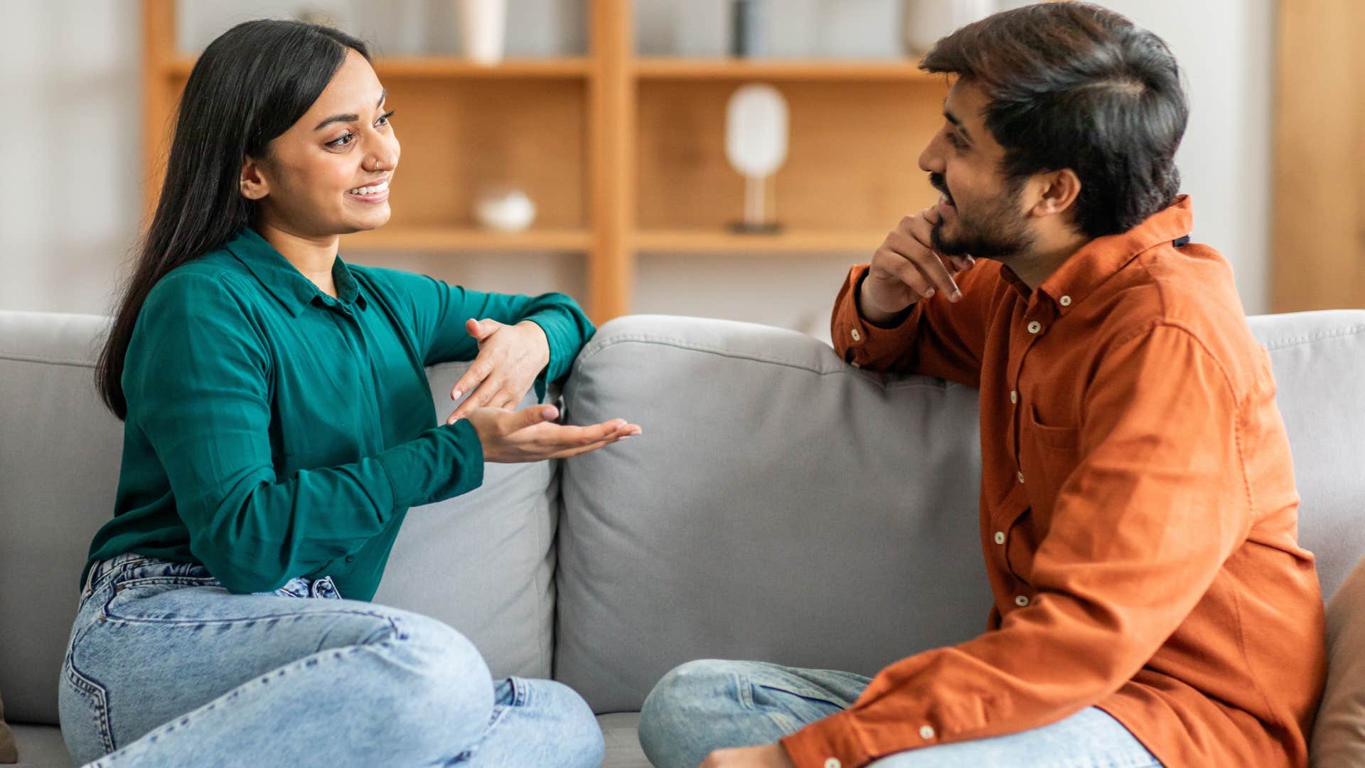 man and woman having a polite conversation