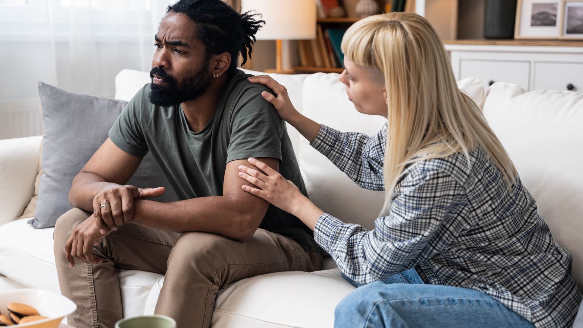 rude man avoiding answering woman's questions