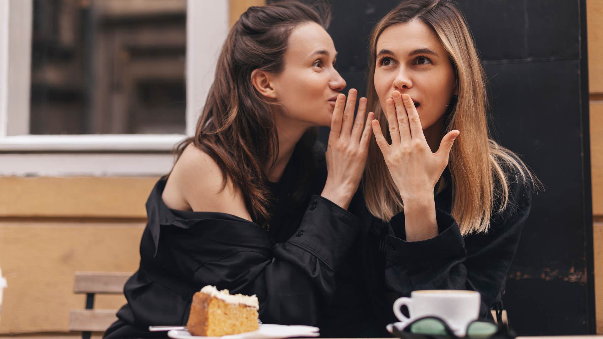 rude women having private conversation in public