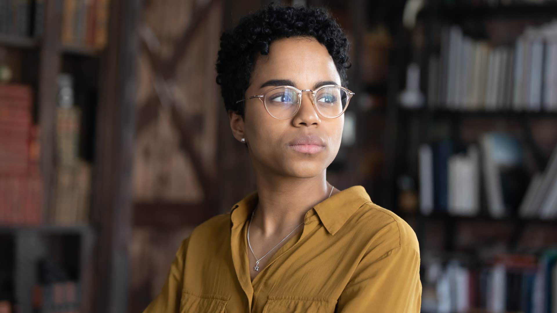 serious woman with low self-confidence staring