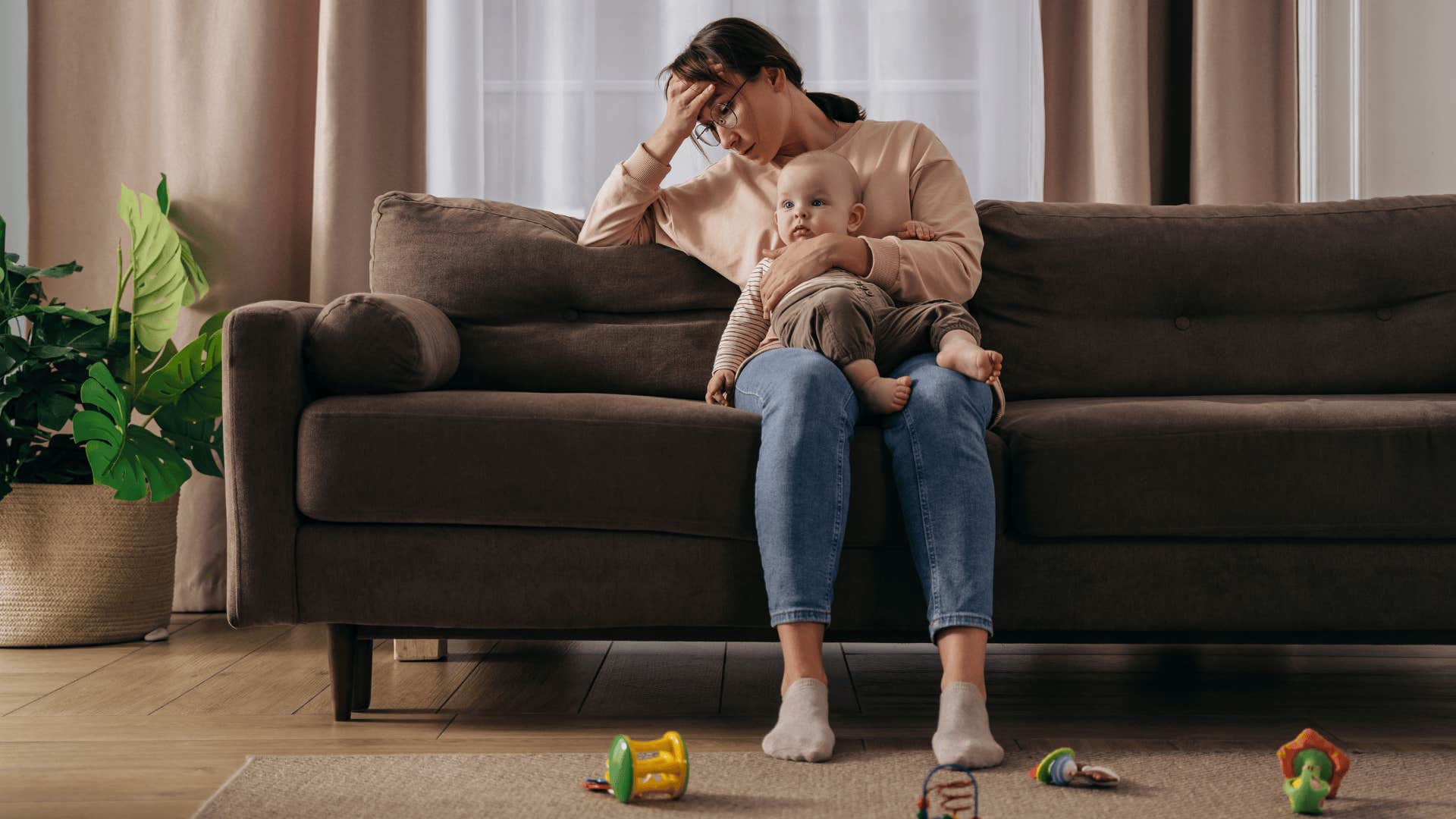 upset mother thinking about regrets