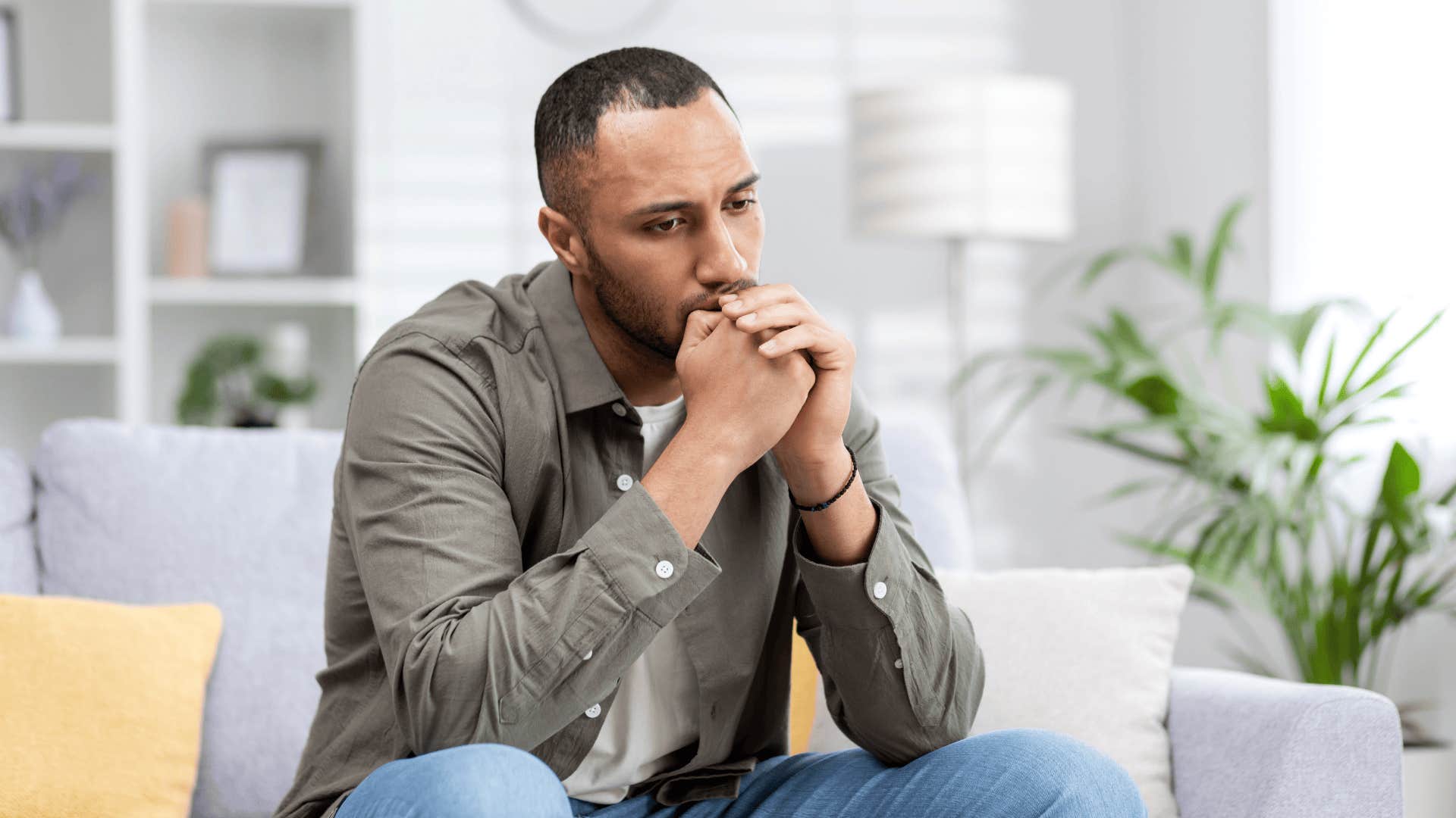 upset man thinking about regrets