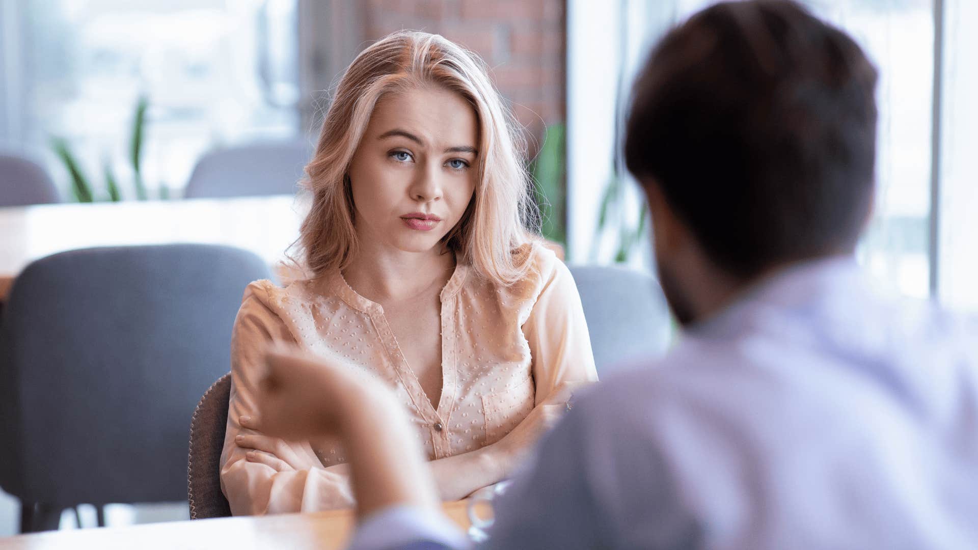 woman upset with man after remembering brutal dating truths