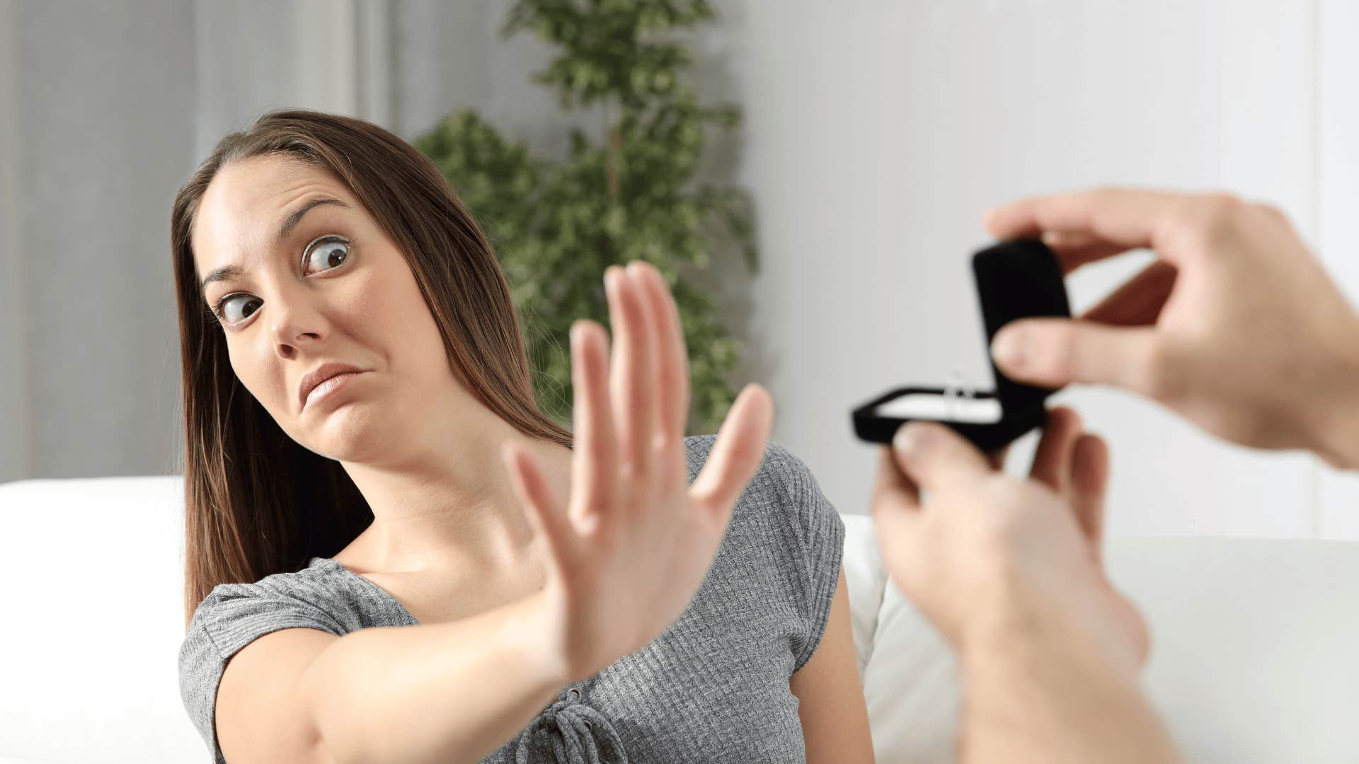 woman rejecting proposal after remembering brutal dating truths