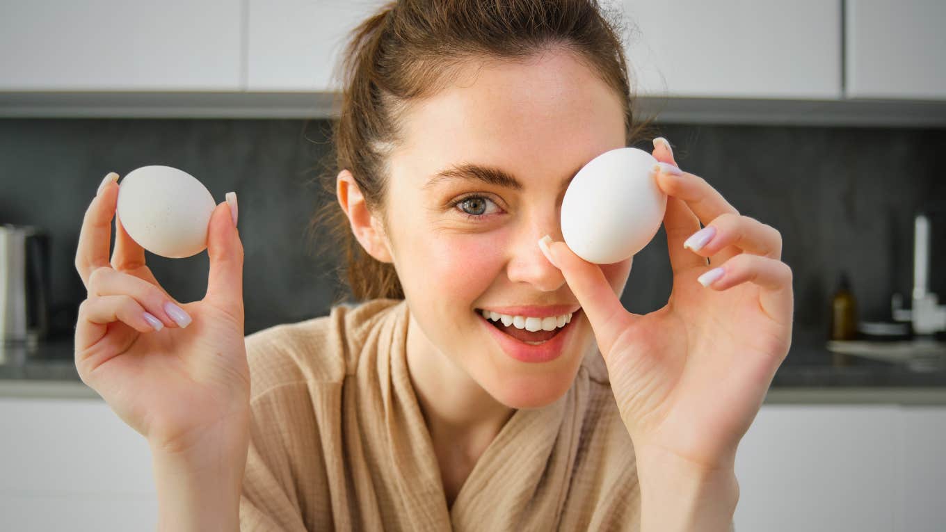 daily habits that were normal 5 years ago but feel totally outdated now woman holding eggs daily habit that was normal 5 years ago but feels totally outdated now