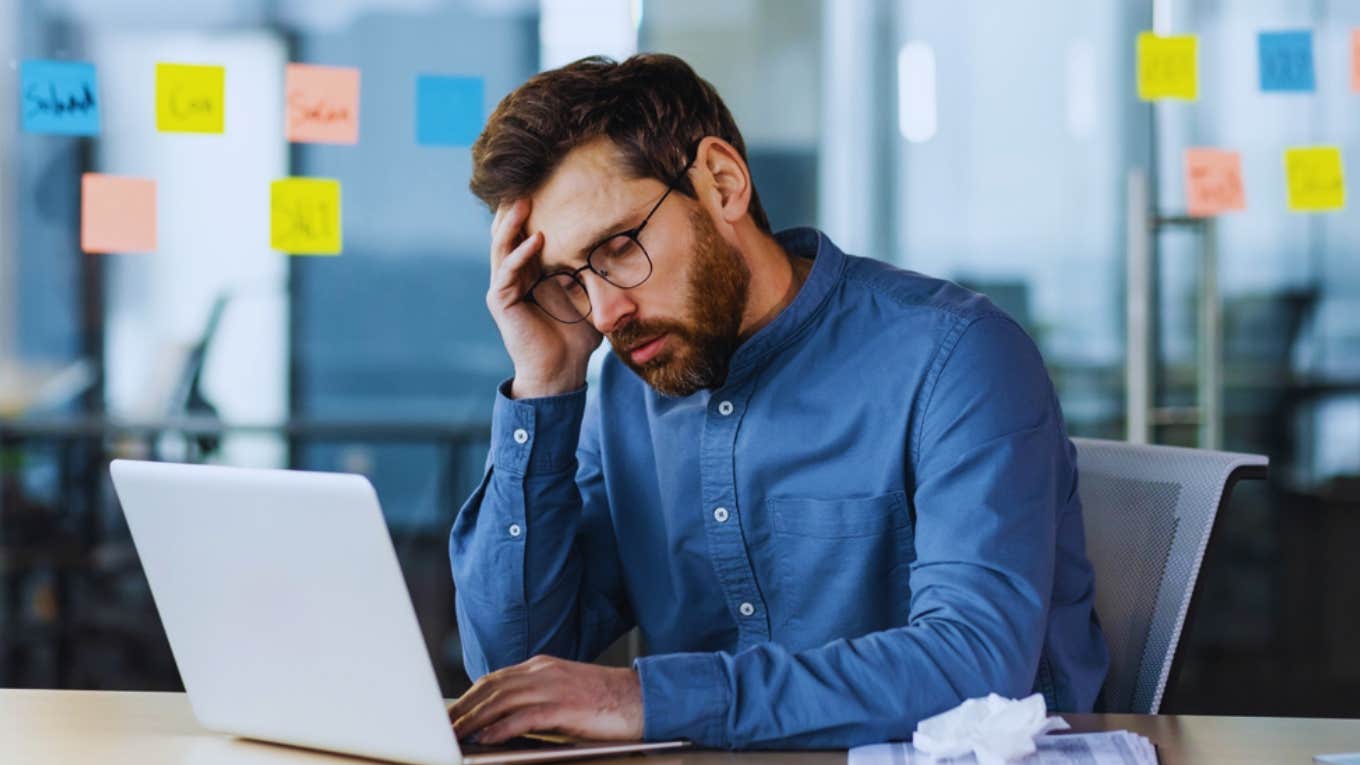 Career Coach Says These Three Emotions Have Been Normalized At Toxic Jobs man stressed at toxic job