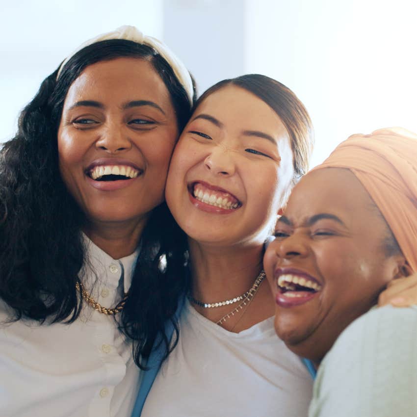 group of smiling women who used to blame the other women