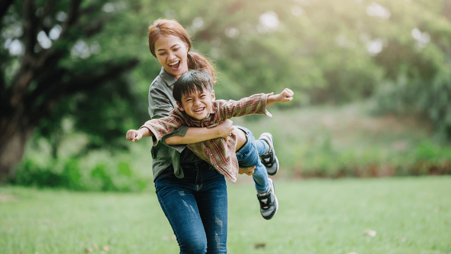 mother playing with son as incredible side effect of being a parent