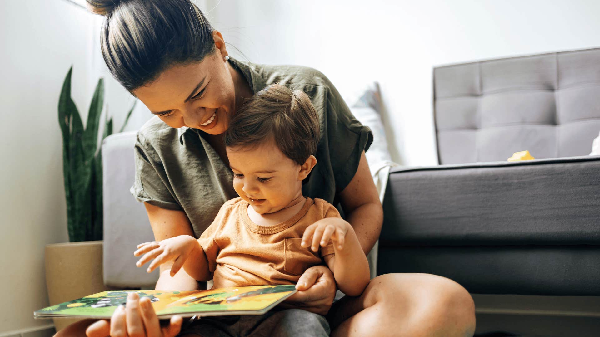 mother reading with son as incredible side effect of being a parent