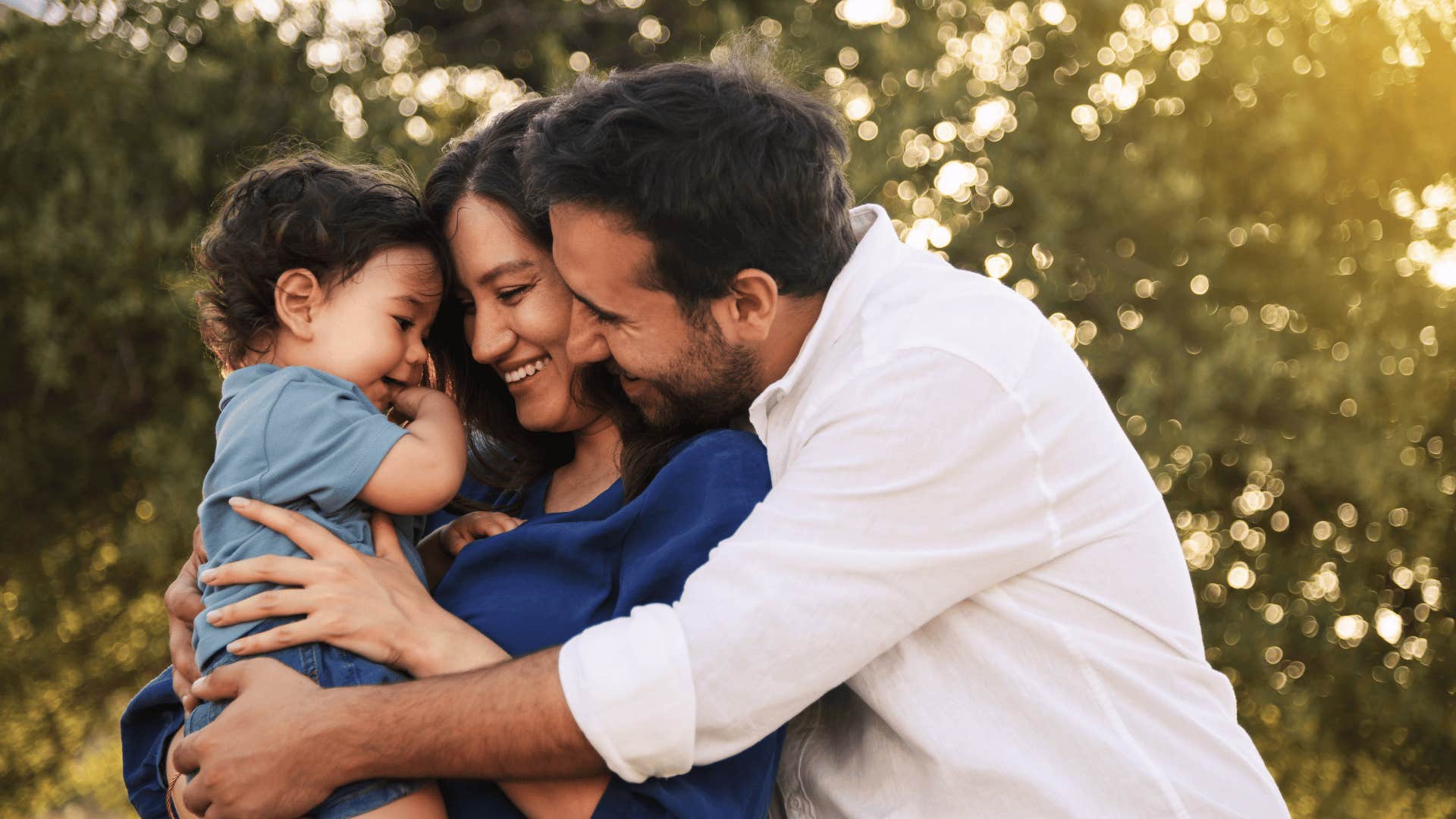 happy parents with child as incredible side effect of being a parent