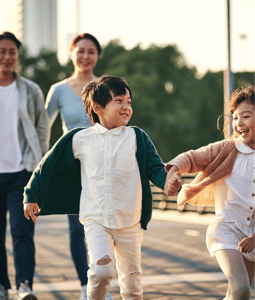 Family walking and siblings feel safe because parents never compare them
