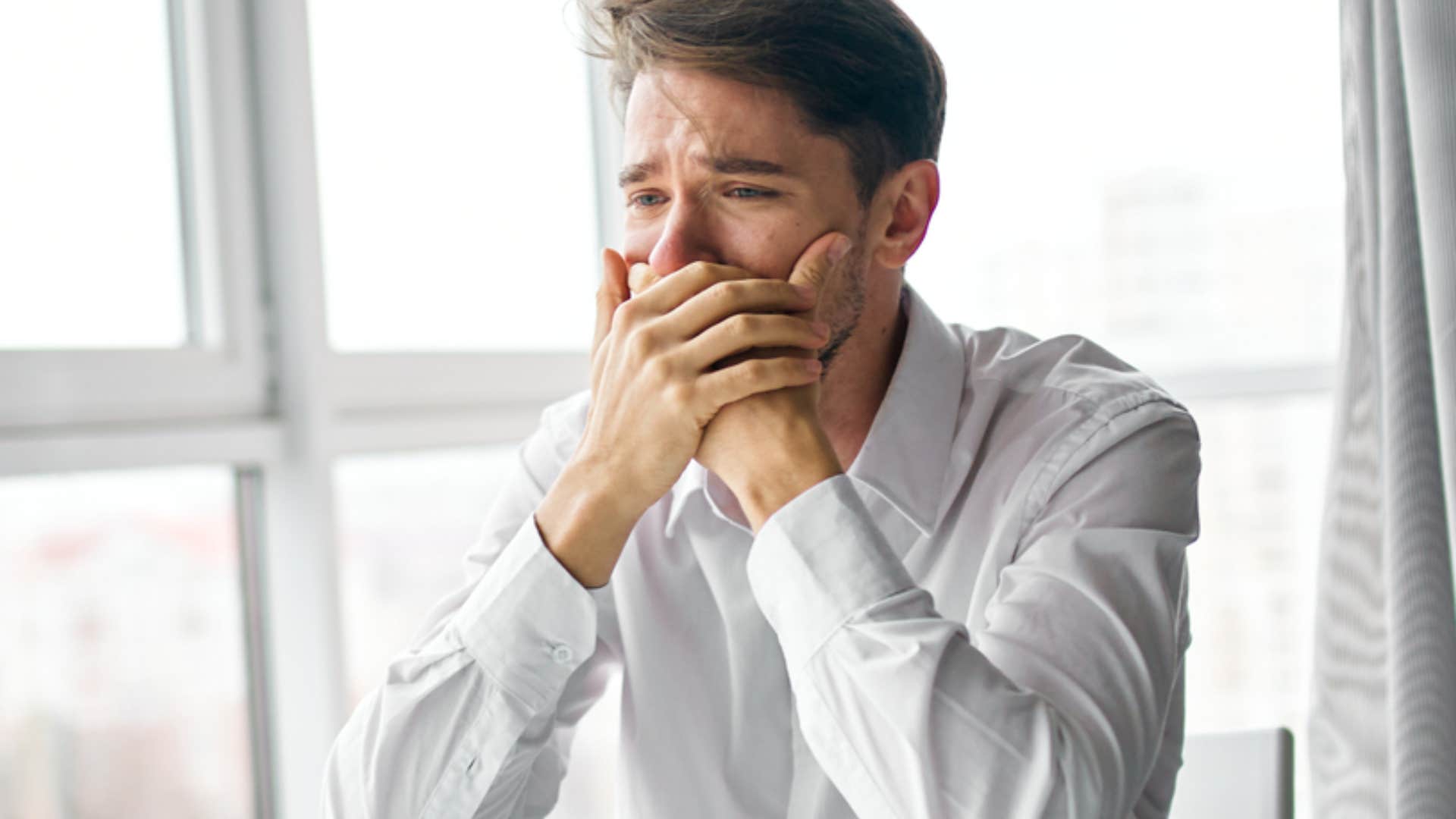 sensitive man being vulnerable and crying
