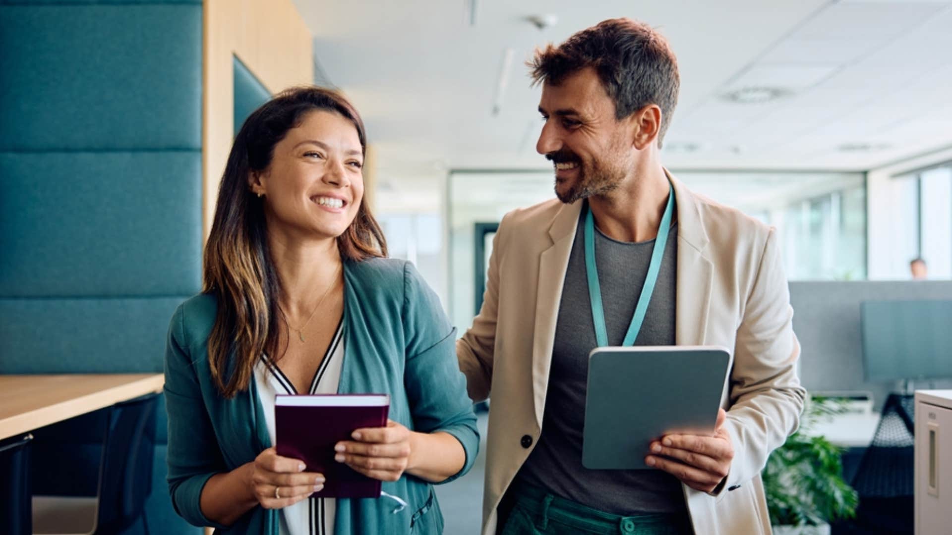 emotionally intelligent man chatting with coworker