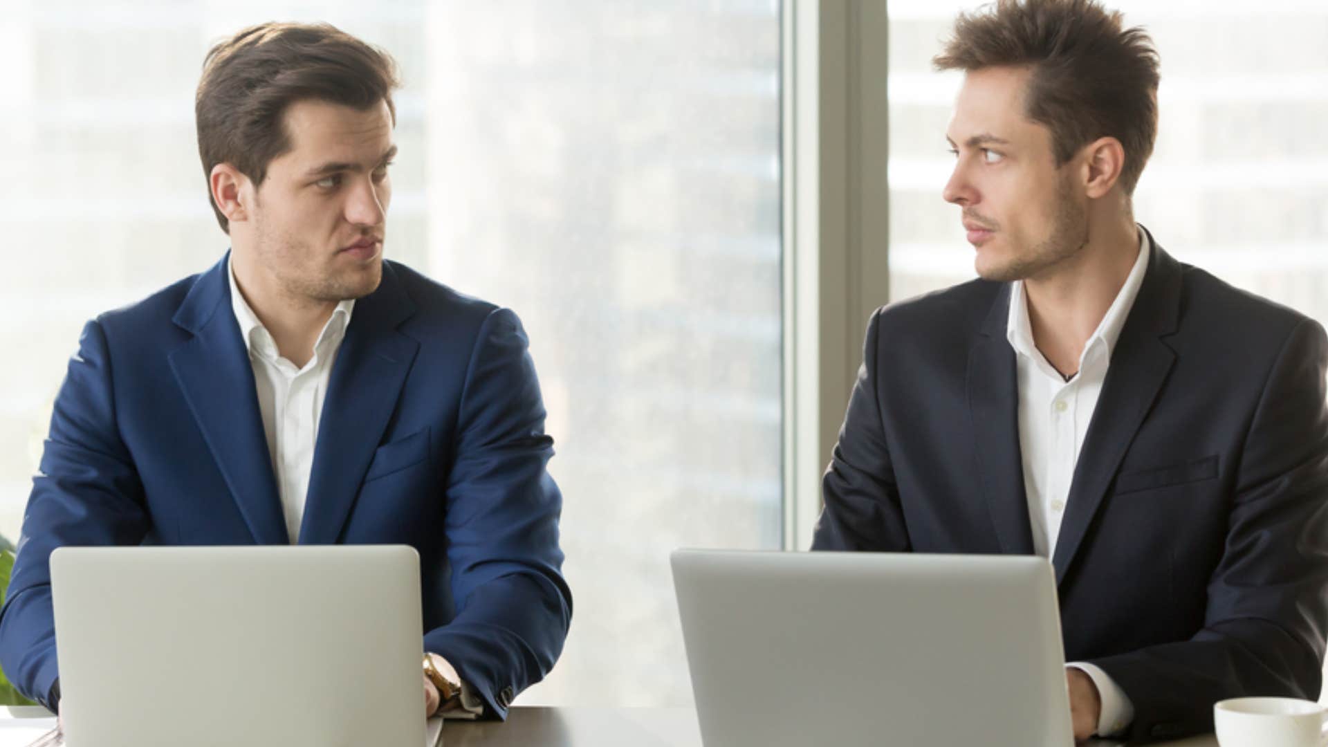 two male coworkers competing with each other 