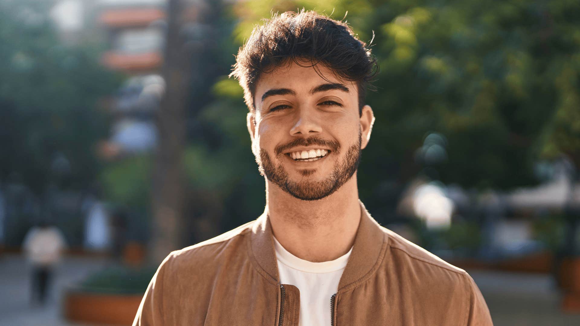 man smiling after having one of life's wake-up calls