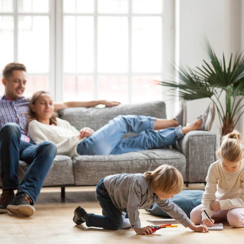 parents relaxing while children play because millennial parents are too soft