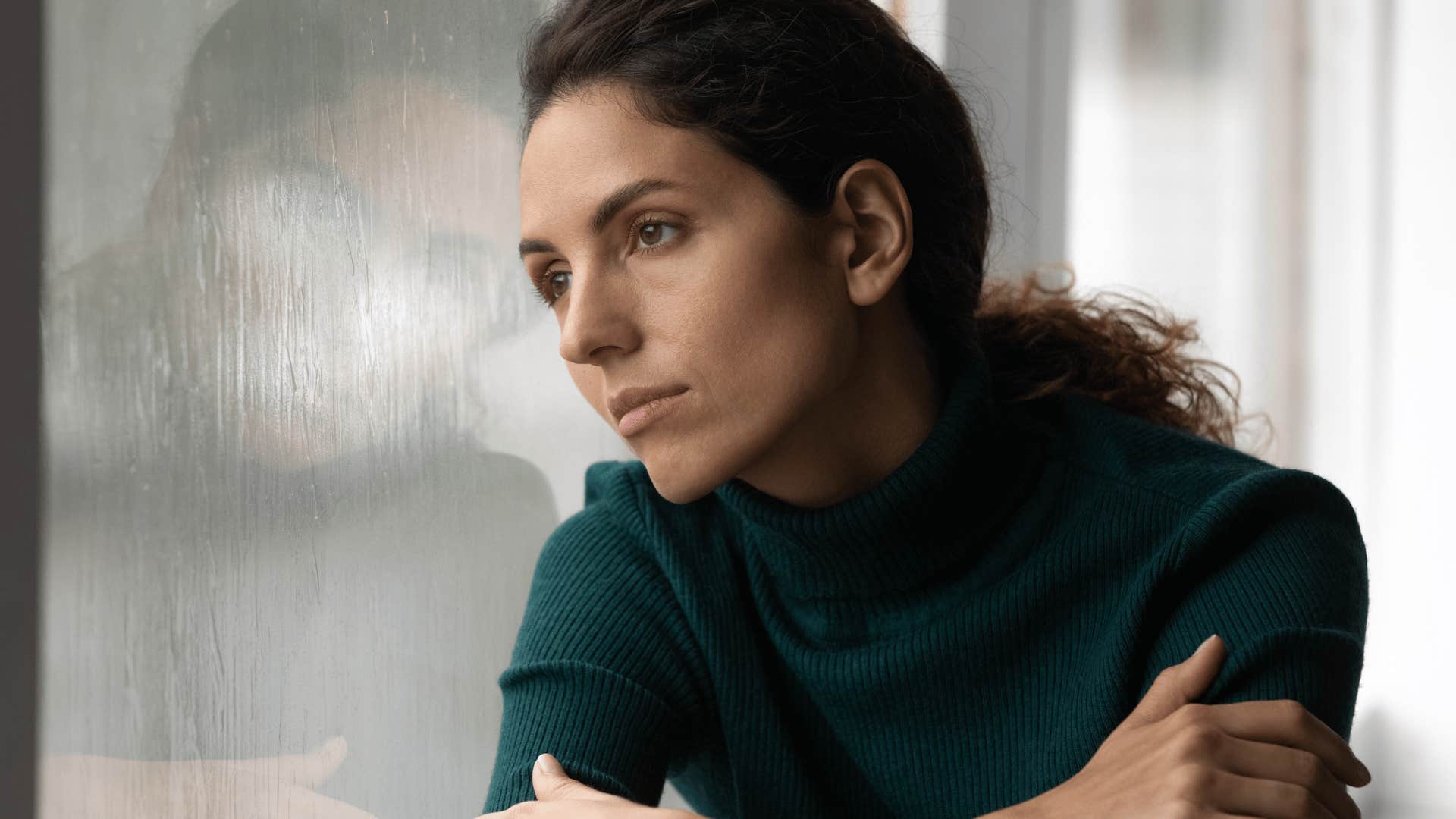 woman facing her failure looking sad