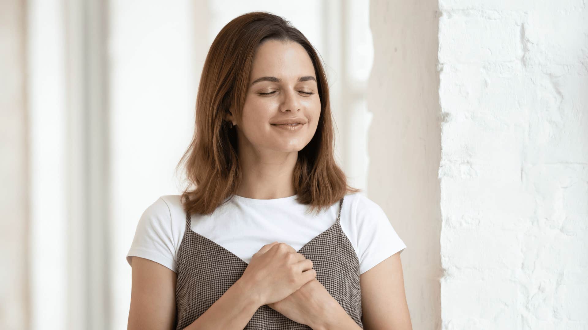 smiling woman recognizing her strength