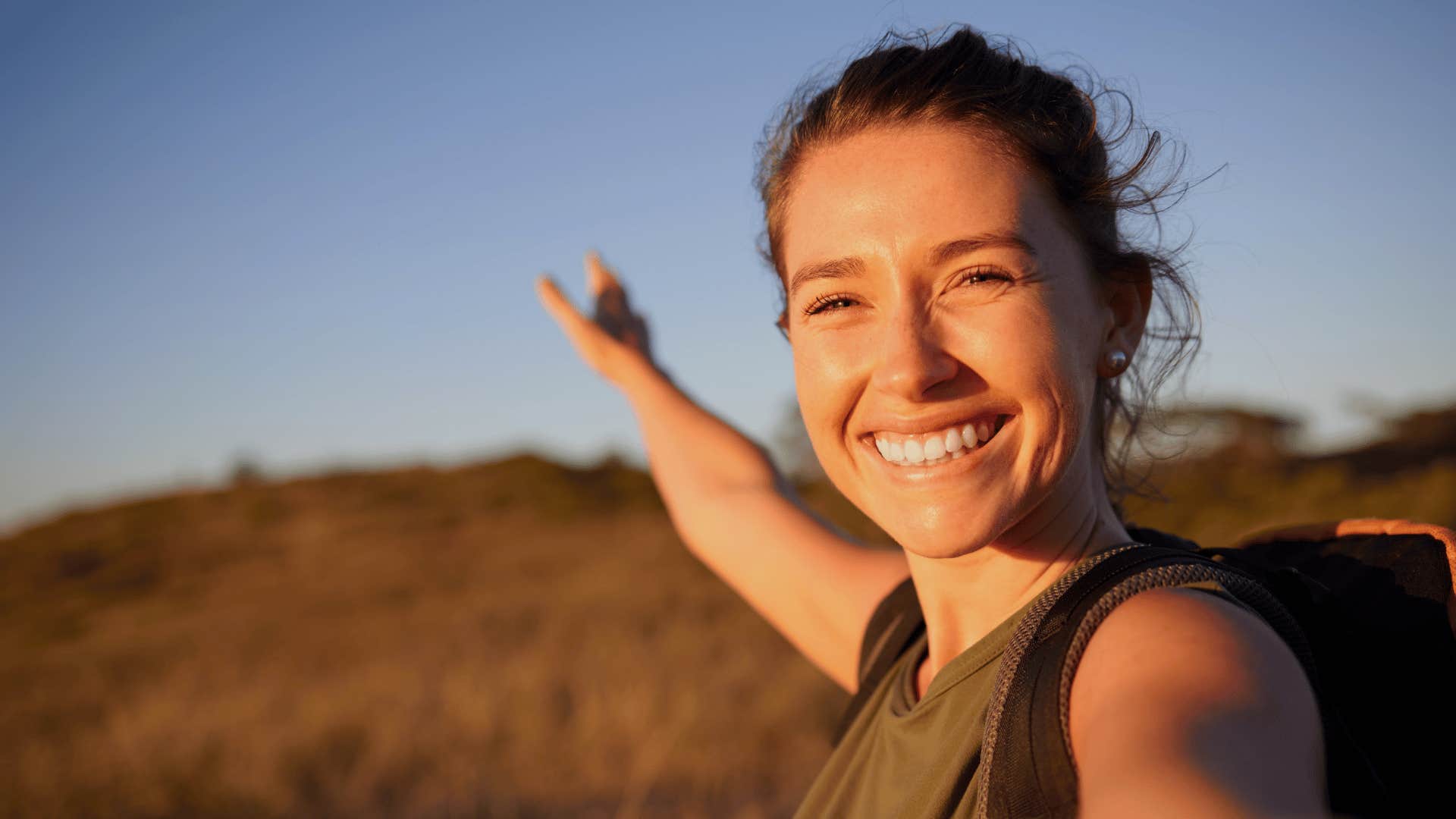 happy woman traveling solo